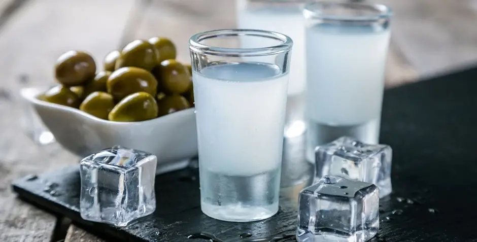 Ouzo with cold water and ice